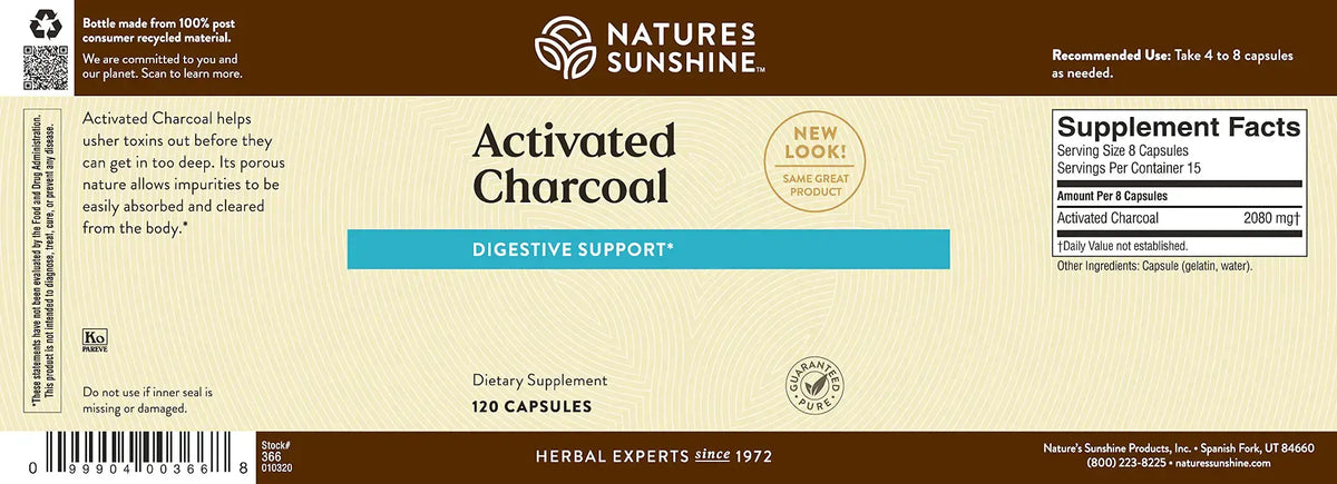 Natures Sunshine Activated Charcoal supplement label with text and branding.