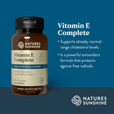 Nature's Sunshine Vitamin E Complete dietary supplement bottle on a dark blue background with product text and benefits listed on the right.
