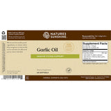 Natures Sunshine Garlic Oil dietary supplement box, 60 softgels, featuring a beige and brown label with product details and a supplement facts panel.