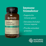 Nature's Sunshine Immune Stimulator herbal supplement bottle on a teal background with product benefits listed in white text.
