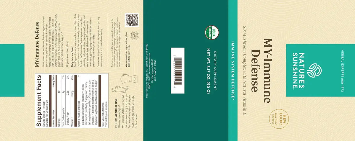 A flat, front-facing view of a supplement package design with three vertical panels: a beige back panel with supplement facts, a dark teal center panel with a barcode, and a beige front panel with the product name 'My Immune Defense' and a teal 'Nature's Sunshine' logo.