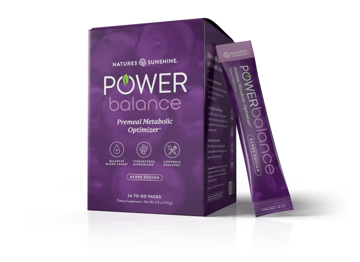 Nature's Sunshine Power Balance pre-meal metabolic optimizer dietary supplement packaging, showing a purple box with a single matching stick pack standing beside it on a white background.