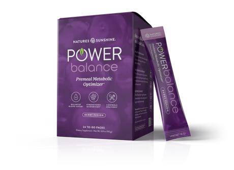 Nature's Sunshine Power Balance pre-meal metabolic optimizer dietary supplement packaging, showing a purple box with a single matching stick pack standing beside it on a white background.