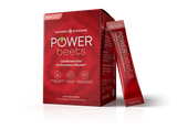 Nature's Sunshine Power Beets dietary supplement box in red packaging with two individual stick packs standing beside it on a white background.