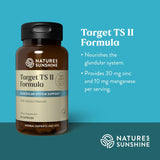 A bottle of Nature's Sunshine Target TS II Formula dietary supplement on a teal background, with text describing its benefits for the glandular system.