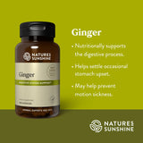 Natures Sunshine Ginger Digestive System Support dietary supplement bottle on a green background with text describing ginger benefits.