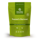 Nature's Sunshine Nature's Harvest Super-Food Instant Beverage in a lime green resealable pouch, displayed on a clean white background.
