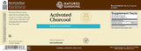 Natures Sunshine Activated Charcoal supplement label with text and branding.