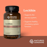 Natures Sunshine Lecithin supplement bottle on a peach background with product details.