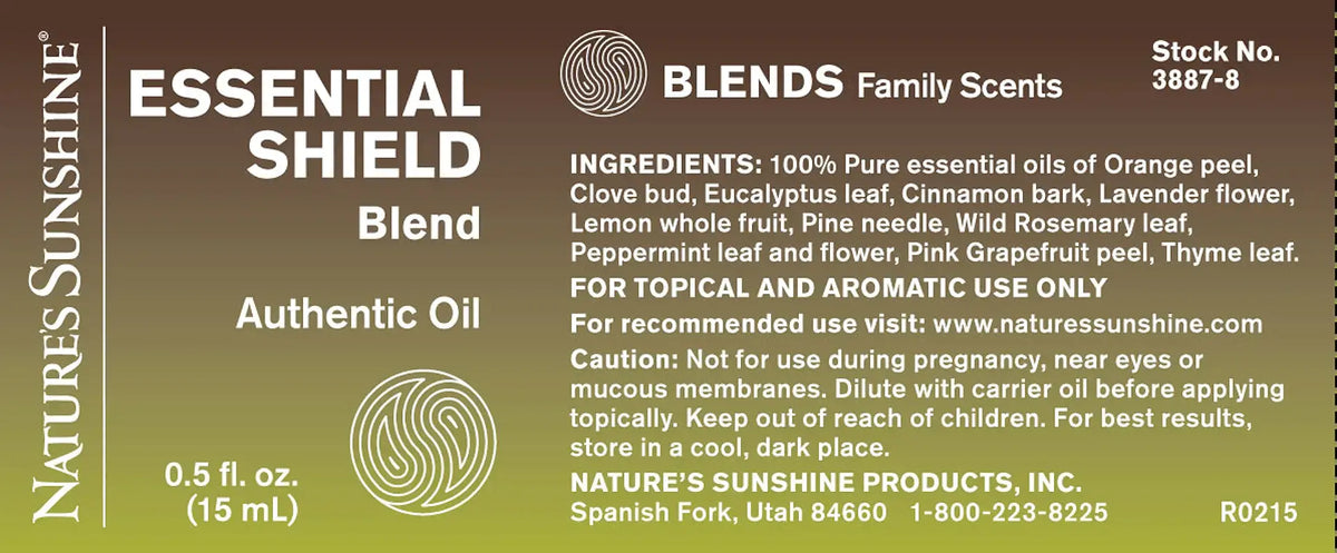 A rectangular product label for Nature's Sunshine ESSENTIAL SHIELD Blend authentic oil, showing blend details, ingredients, and usage information on a brown-to-black gradient background.