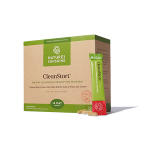 Nature's Sunshine CleanStart dietary supplement box with a single packet standing beside it and two capsules in front, on a clean white background.