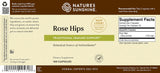 Front label of a Nature's Sunshine Rose Hips herbal supplement bottle, showing product name, supplement facts, usage, and barcode on a cream background with brown and green accents.
