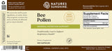 Natures Sunshine Bee Pollen dietary supplement label showing 100 capsules, with a brown header, beige background, green banner, and Supplement Facts panel on the right.