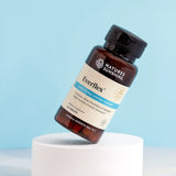 A bottle of Nature's Sunshine Everflex dietary supplement floating above a white cylindrical pedestal against a light blue background.