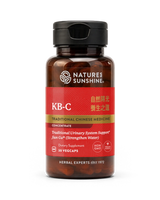 A bottle of Nature's Sunshine KB-C Traditional Chinese Medicine dietary supplement, featuring a dark amber bottle, black cap, and a red label with gold and white text.
