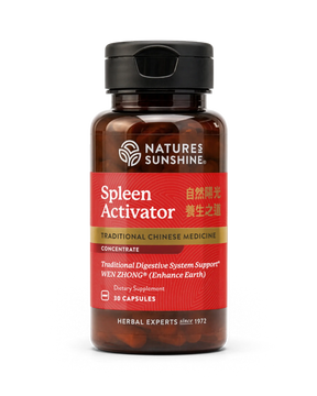 A bottle of Natures Sunshine Trigger Immune dietary supplement, featuring a dark amber brown bottle, a black cap, and a red label with gold and white text.