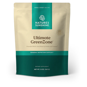 Natures Sunshine Ultimate GreenZone dietary supplement pouch, 13 oz (369 g). The stand-up pouch is beige with a teal top panel and a dark teal bottom section, featuring the product name and brand logo.
