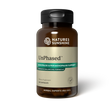 A bottle of Natures Sunshine UnPhased dietary supplement, featuring a dark amber brown bottle, a black cap, and a beige label with green accents, set against a plain white background.