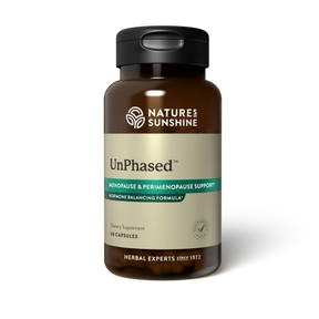 A bottle of Natures Sunshine UnPhased dietary supplement, featuring a dark amber brown bottle, a black cap, and a beige label with green accents, set against a plain white background.