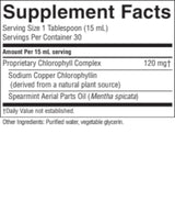 A close-up of a supplement facts label showing the Supplement Facts panel for a chlorophyll-based product. The label lists serving size as 1 tablespoon (15 mL), servings per container as 30, and lists ingredients including Proprietary Chlorophyll Complex at 120 mg, Sodium Copper Chlorophyllin, and Spearmint Aerial Parts Oil (Mentha spicata).