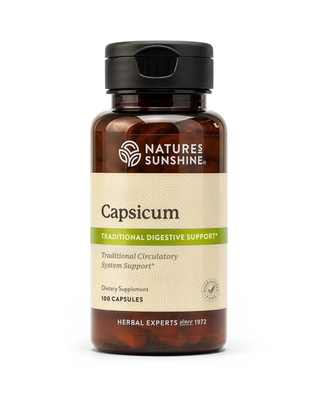 A bottle of Nature's Sunshine Capsicum dietary supplement, featuring an amber brown bottle, a black flip-top cap, and a cream-colored label with green accents.