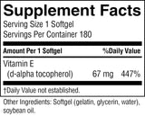 A close-up of a supplement facts label showing Vitamin E (d-alpha tocopherol) with 67 mg and 447% daily value, plus other ingredients listed at the bottom.