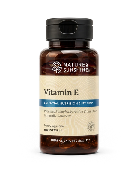 A bottle of Nature's Sunshine Vitamin E dietary supplement, 180 softgels, in an amber brown bottle with a black cap and a beige label.