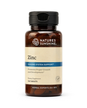 Nature's Sunshine Zinc dietary supplement bottle with amber plastic and a beige label, shown on a plain white background.