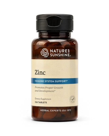 Nature's Sunshine Zinc dietary supplement bottle with amber plastic and a beige label, shown on a plain white background.