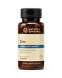 Nature's Sunshine Zinc dietary supplement bottle with amber plastic and a beige label, shown on a plain white background.