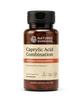 Nature's Sunshine Caprylic Acid Combination dietary supplement bottle, containing 90 vegcaps, on a clean white background.