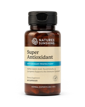A bottle of Nature's Sunshine Super Antioxidant dietary supplement, featuring an amber brown bottle, a black cap, and a beige label with blue accents.
