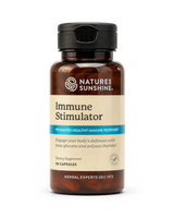 A bottle of Nature's Sunshine Immune Stimulator dietary supplement, featuring an amber brown bottle, beige label, and black cap, set against a plain white background.