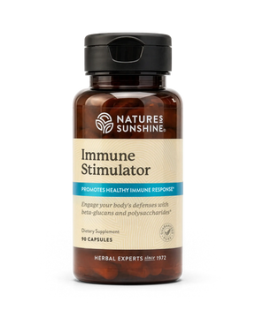 A bottle of Nature's Sunshine Immune Stimulator dietary supplement, featuring an amber brown bottle, beige label, and black cap, set against a plain white background.