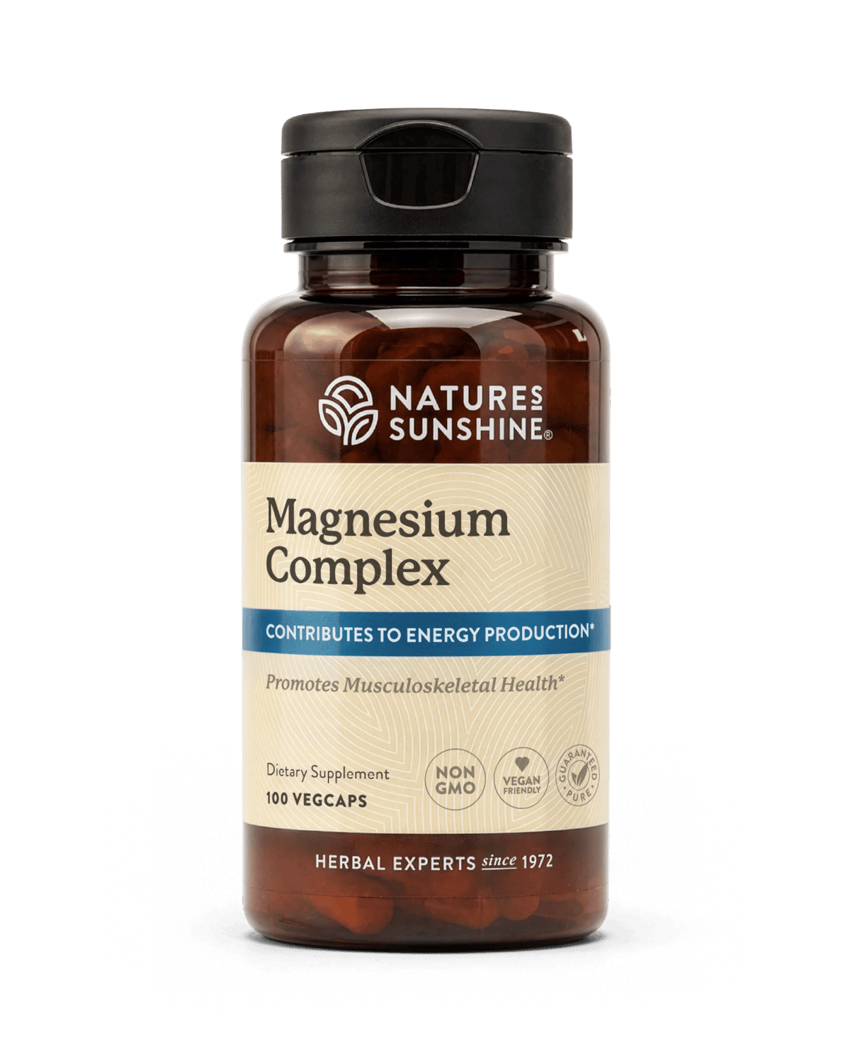 Nature's Sunshine Magnesium Complex dietary supplement bottle with a black cap and amber-brown plastic, containing 100 vegcaps, on a white background.