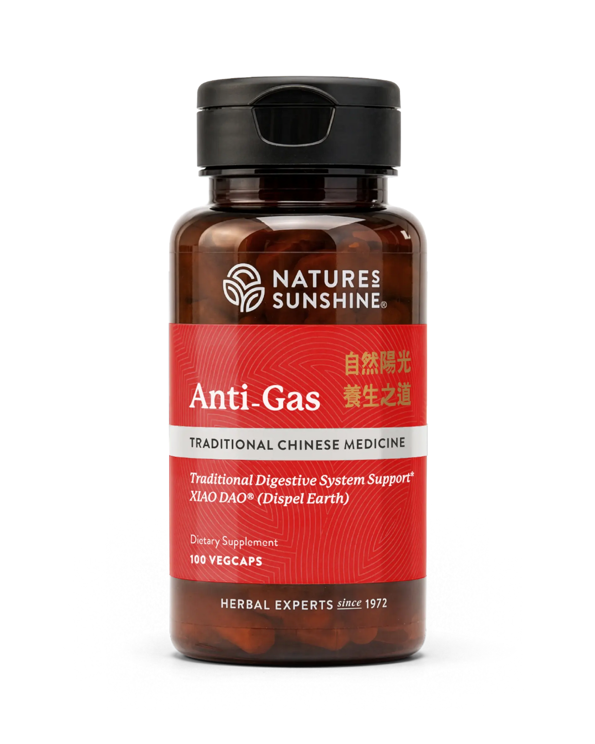A bottle of Nature's Sunshine Anti-Gas dietary supplement, featuring a dark amber glass bottle, a black cap, and a red label with white and gold text.