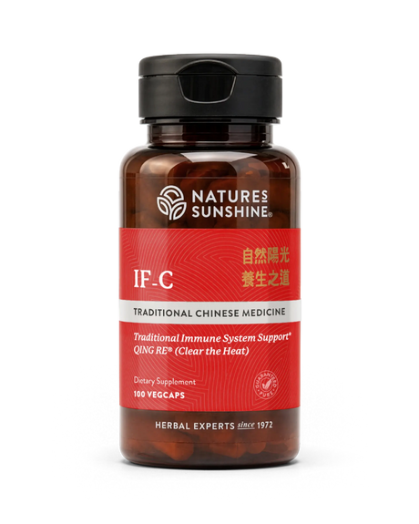 A bottle of Natures Sunshine IF-C Traditional Chinese Medicine dietary supplement with a black cap and a red label, containing 160 vegcaps.