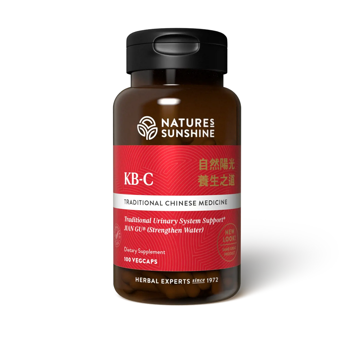 A bottle of Natures Sunshine KB-C Traditional Chinese Medicine dietary supplement, featuring a dark amber brown bottle, a black cap, and a label with red, white, and silver sections.