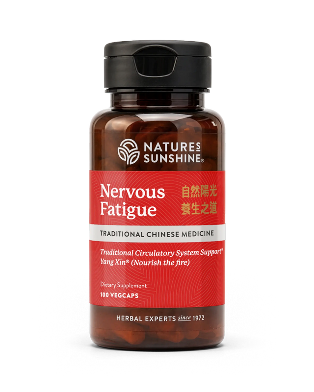 A bottle of Natures Sunshine Nervous Fatigue dietary supplement, featuring a dark amber bottle, black cap, and a red label with white and gold text.
