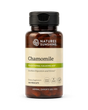 A bottle of Nature's Sunshine Chamomile dietary supplement with amber brown plastic, a black cap, and a beige label with green accents, shown on a white background.