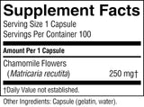 A close-up of a supplement facts label showing serving size 1 capsule, 100 servings per container, chamomile flowers (Matricaria recutita) 250 mg, and other ingredients listed as capsule (gelatin, water).