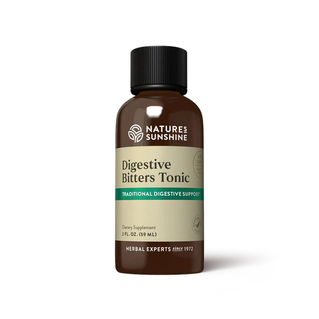 A bottle of Nature's Sunshine Digestive Bitters Tonic on a clean white background. The product is in an amber brown glass bottle with a black ribbed cap and a beige label featuring green and white text.