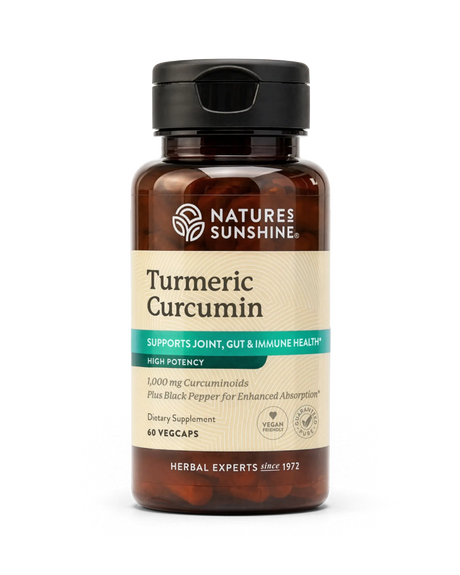 A bottle of Nature's Sunshine Turmeric Curcumin dietary supplement, containing 60 vegcaps, shown on a clean white background.