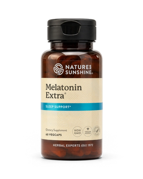 A bottle of Natures Sunshine Melatonin Extra dietary supplement, containing 60 vegcaps, on a clean white background.