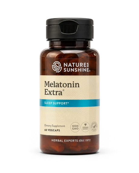A bottle of Natures Sunshine Melatonin Extra dietary supplement, containing 60 vegcaps, on a clean white background.