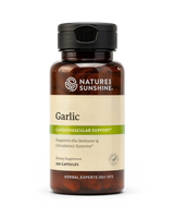 A bottle of Nature's Sunshine Capsicum dietary supplement, featuring an amber brown bottle, a black flip-top cap, and a cream-colored label with green accents.