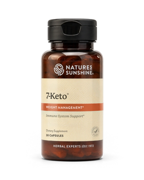 A bottle of Natures Sunshine 7Keto dietary supplement with amber brown plastic, a black cap, and a beige label with orange accents, containing 10 capsules.