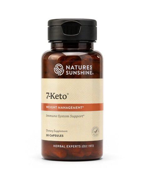 A bottle of Natures Sunshine 7Keto dietary supplement with amber brown plastic, a black cap, and a beige label with orange accents, containing 10 capsules.