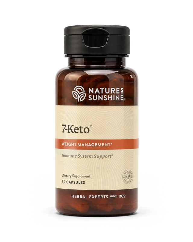 A bottle of Natures Sunshine 7Keto dietary supplement with amber brown plastic, a black cap, and a beige label with orange accents, containing 10 capsules.