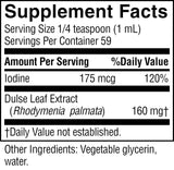 A close-up of a supplement facts label showing iodine content and dulse leaf extract, with text listing vegetable glycerin and water as other ingredients.